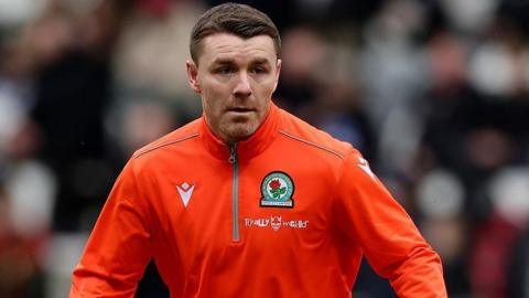 John Fleck warming up for Blackburn Rovers