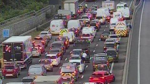 Four lanes of queueing traffic on the M23