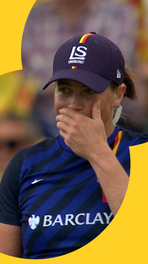 Grace Harris with her hand over her mouth