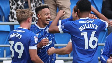  Callum Robinson of Cardiff City is congratulated after scorin