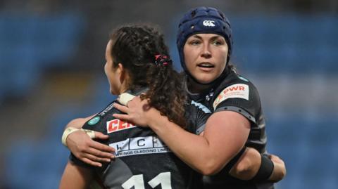 Exeter Chiefs try scorers Sabrina Poulin and Ebony Jefferies celebrate