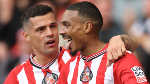 Sunderland's players celebrate scoring against Aston Villa