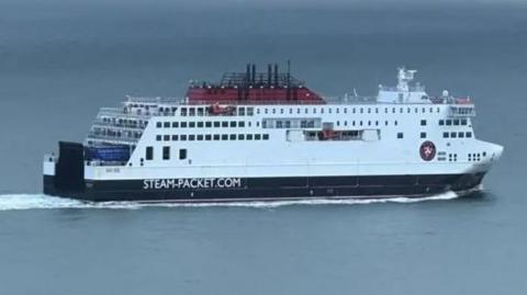 A close-up of the Manxman, a large white ferry that reads Steam Packet on the side.