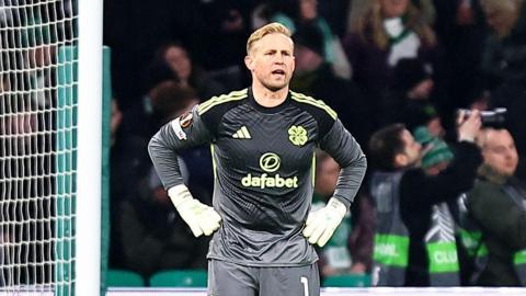 Kasper Schmeichel looks dejected after conceding a goal against Stuttgart