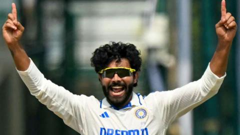 Ravindra Jadeja celebrating a wicket.