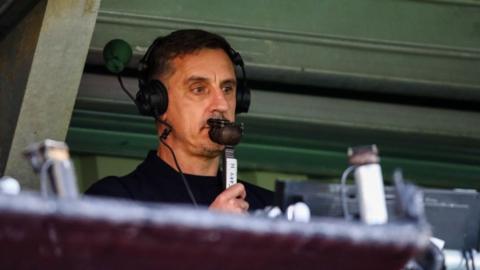 Gary Neville on commentary duties at Salford City's Moor Lane ground in 2023
