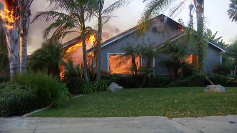 California wildfires destroy homes