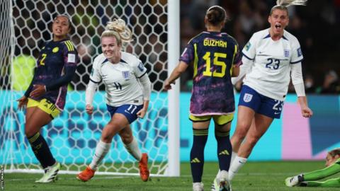 Lauren Hemp celebrates scoring against Colombia