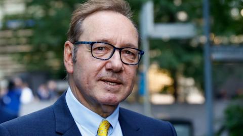 Actor Kevin Spacey walks outside Southwark Crown Court