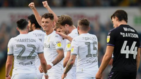 Leeds celebrate against a dejected Charlton