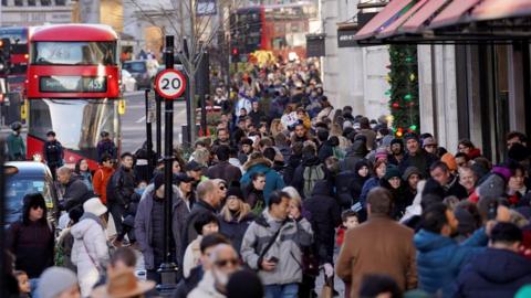 File image showing shoppers on Regent Street in the West End.