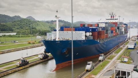 Cargo ship entering the Panama Canal at Miraflores Locks, Panama City