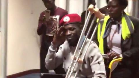 Bobi Wine in a wheelchair prior to his departure at Entebbe International Airport, Uganda, 31 August 2018