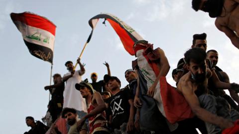 Iraqis gather to mark the first anniversary of the start of anti-government protests in Baghdad, Iraq (25 October 2020)