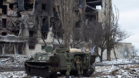 Members of Pro-Russian separatists patrol the pro-Russian separatists-controlled Donetsk, Ukraine on 11 March