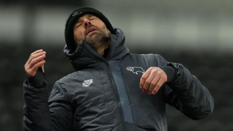 Derby County boss Paul Warne is dejected