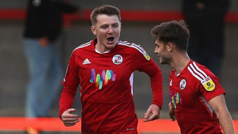 Crawley's James Tilley celebrates