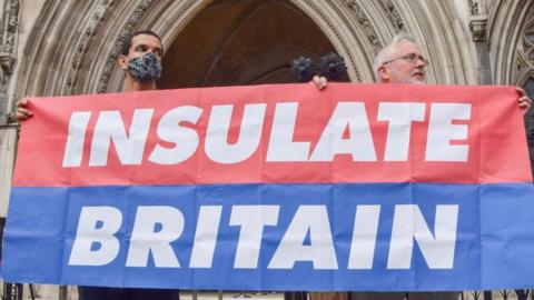 Insulate Britain protestors outside the Royal Courts of Justce