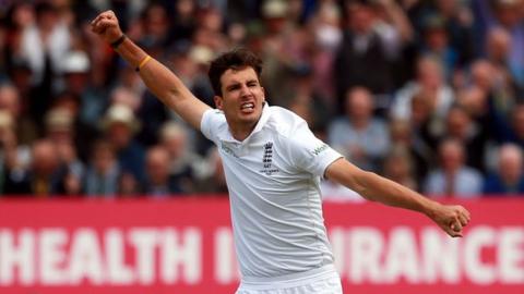 Steven Finn celebrates a wicket