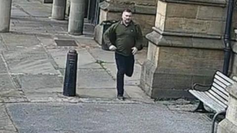 CCTV image of man police want to speak to