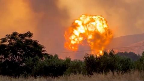 Huge fireball following explosion at ammunition depot in Greece