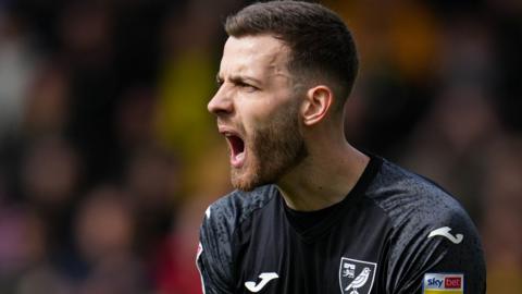 Angus Gunn in action for Norwich City