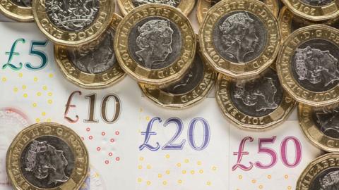 Pound coins and notes