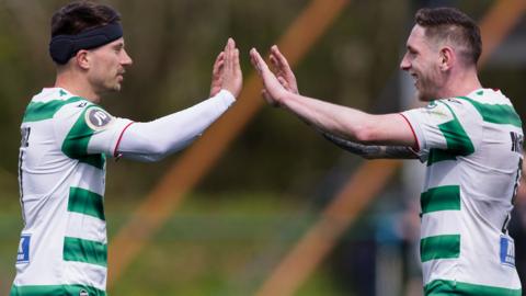 Adrian Cieślewicz and Declan McManus celebrate a goal for The New Saints