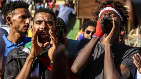 Two men protest in Khartoum, Sudan
