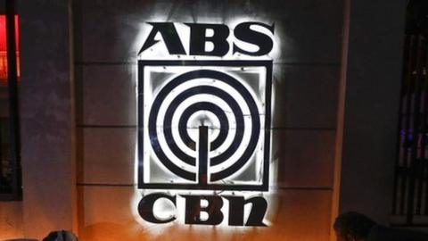 Filipinos light candles in symbolic solidarity outside ABS-CBN network headquarters in Quezon City, Metro Manila, Philippines, on 5 May 2020