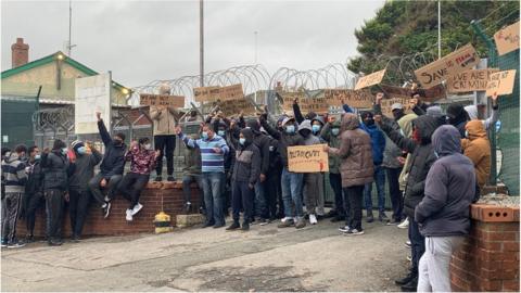 About 40 people took part in the protest outside the camp