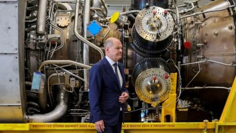German Chancellor Olaf Scholz beside turbine for Nord Stream gas pipeline - 3 August