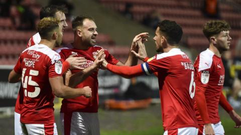 Swindon celebrate Brett Pitman's winner