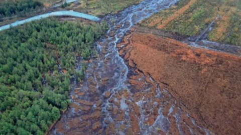 The waterway running into the Derg is shown clogged with peat