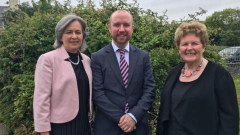 Plaid Cymru candidate Mabon ap Gwynfor with local MP Liz Saville Roberts and Constituency Chair Lis Puw