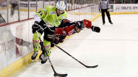 Johan Henrik Eriksson of Ritten Sport escapes the challenge of Mitja Robar of Medvescak Zagreb during the IIHF Continental Cup Third Round Group E match between Ritten and Medvescak Zagreb at the SSE Arena in Belfast