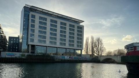 The hotel overlooking the river