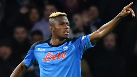 Napoli's Nigerian forward Victor Osimhen celebrates after opening the scoring during the UEFA Champions League round of 16, second leg football match between SSC Napoli and Eintracht Frankfurt at the Diego-Maradona stadium in Naples on March 15, 2023