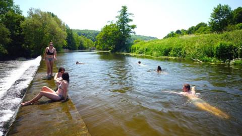 Swimmers at Warleigh Weir near Bath