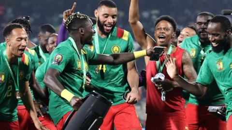 Cameroon players celebrate