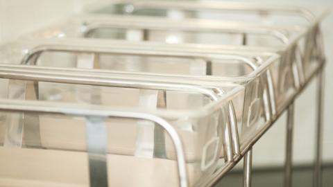 Empty cots in maternity ward