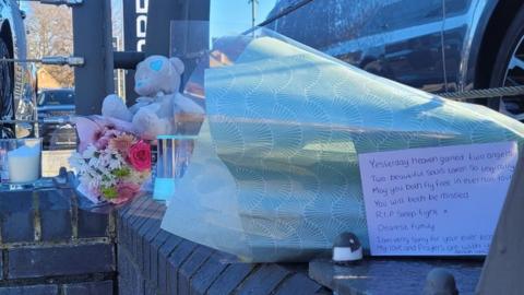 Tributes at the scene