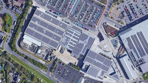 An aerial view of the shopping park showing how the solar panels might be arranged