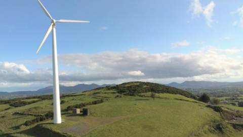 The wind turbine is beside a 5,000-year-old Neolithic burial site which is a scheduled historic monument