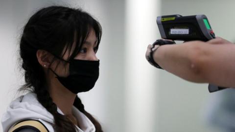 A passenger arriving into Hong Kong International Airport