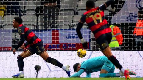 Chris Willock (centre) peels away after scoring QPR's second goal against Preston