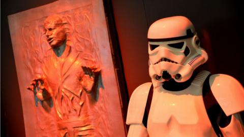 Storm Trooper and Han Solo in carbonite