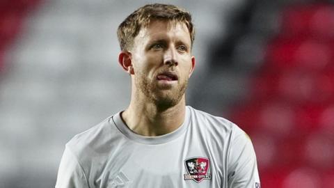 Will Aimson leaves the field after being sent off at Charlton