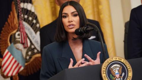 Kim Kardashian speaks as US President Donald Trump holds an event in 2019