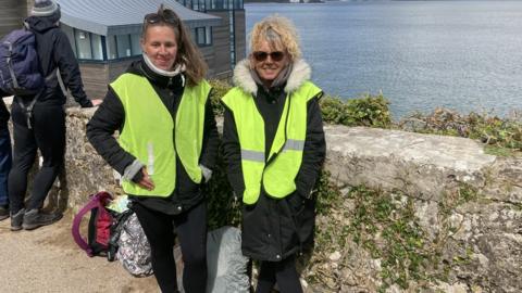 Linda Compton and her daughter Amy on the hill which overlooks the RNLI slipway where Wally the Walrus often stays